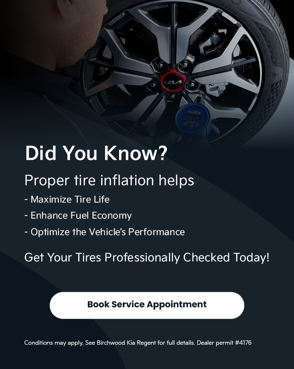 Person checking tire pressure on a Kia wheel with text promoting proper tire inflation benefits and a service appointment button.